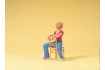 Junge Frau, sitzend. Stuhl