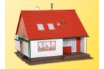 Einfamilienhaus mit Laden   A